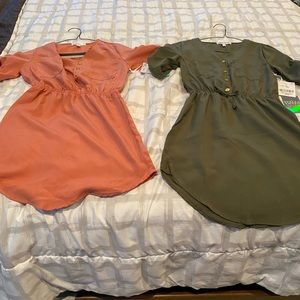 Brand new. 2 dresses. Not sold separately.